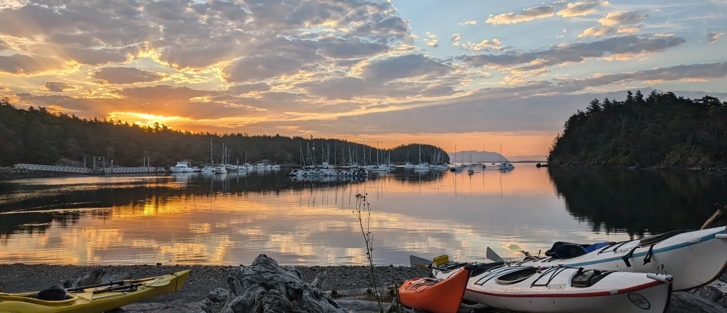 Sunset view with kayaks on Sucia Island