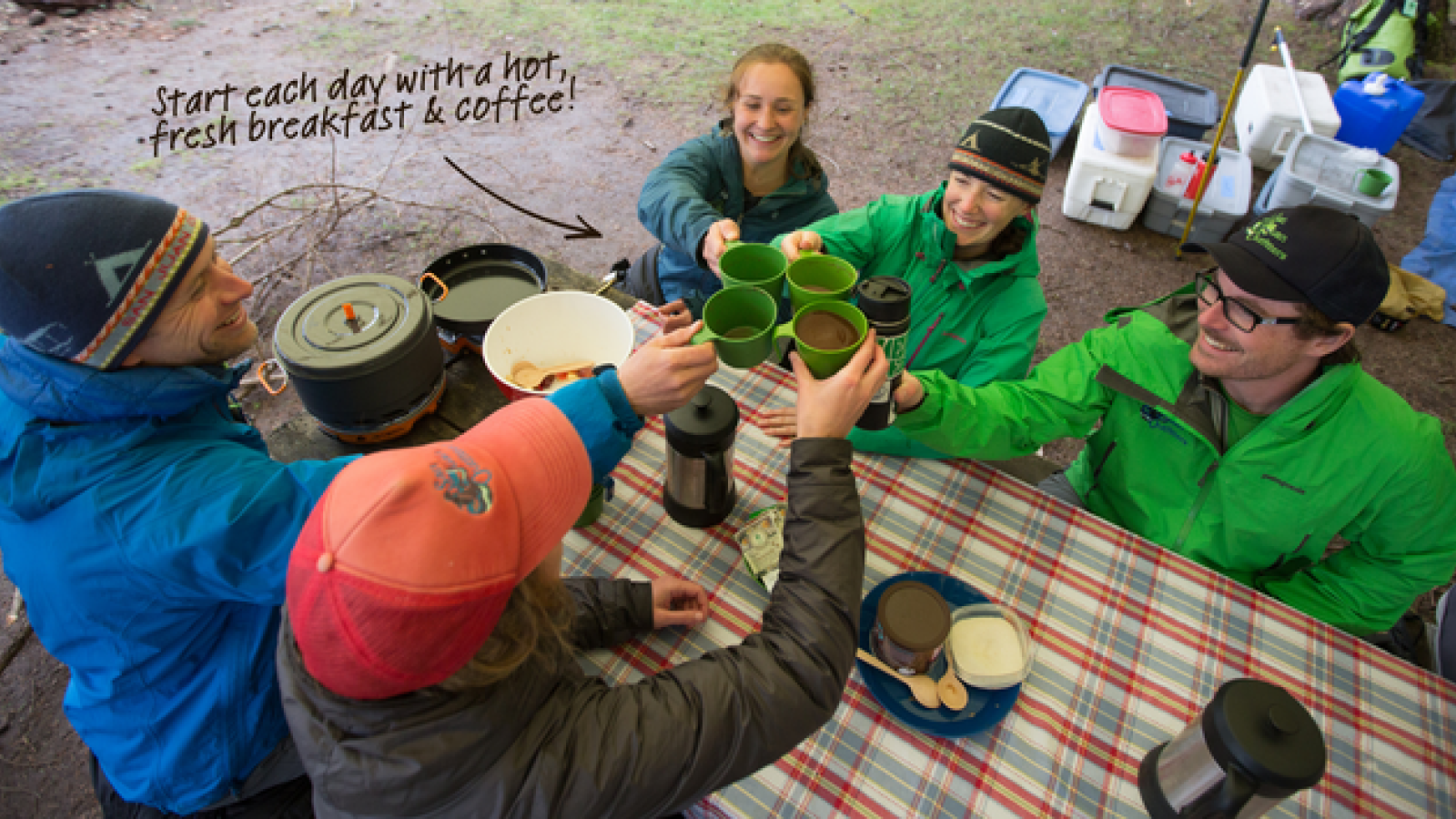 People enjoying a morning coffee at the campsite