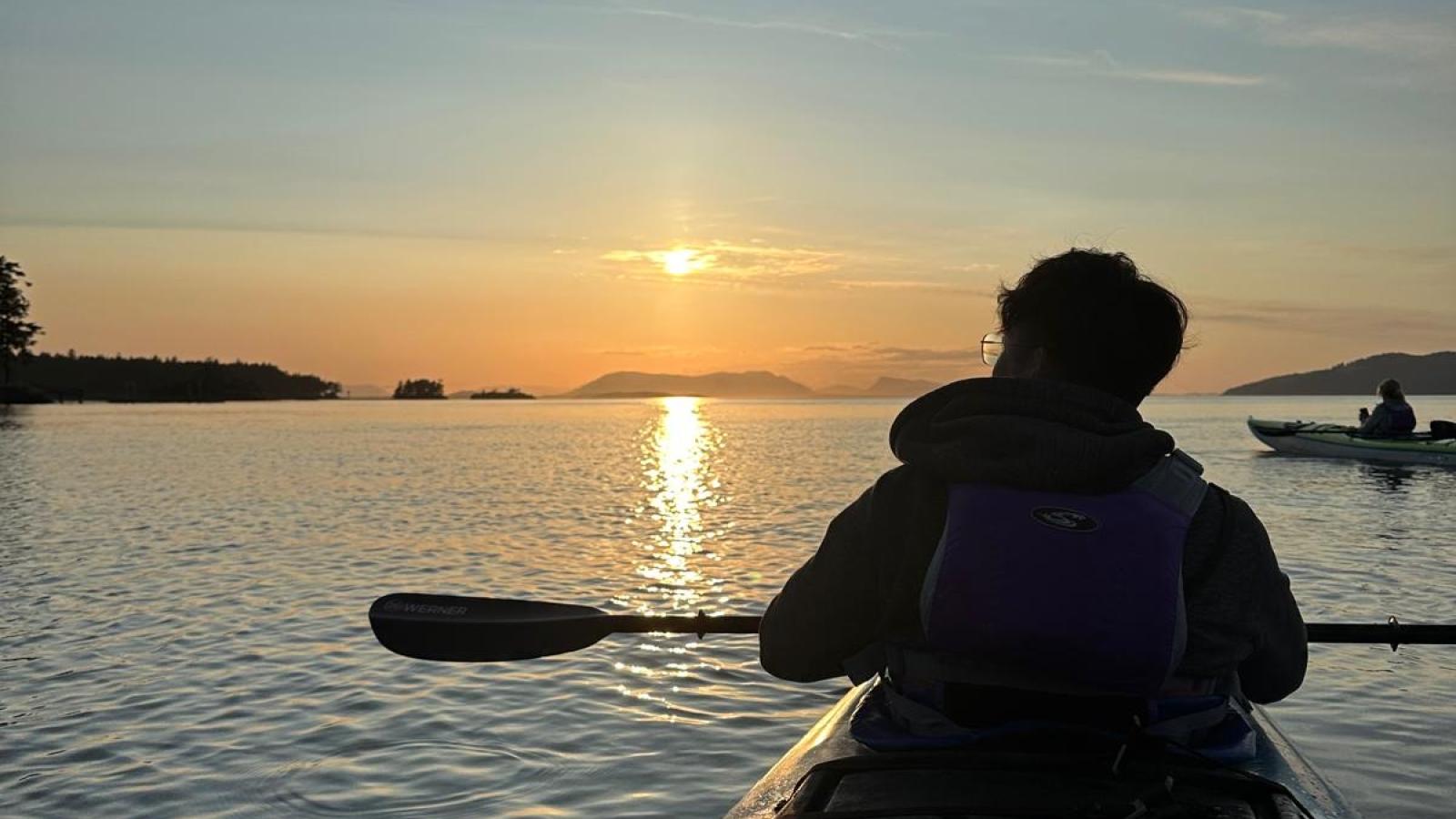 Photo from the back of a kayak